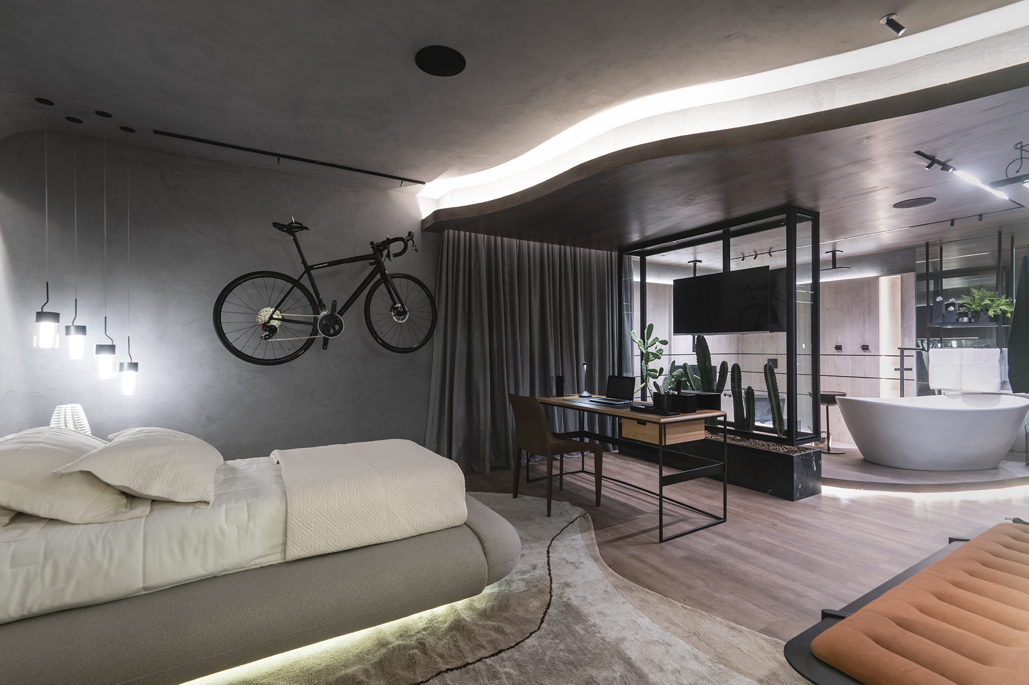 <b>Vânia Sousa Arquitetura - Suíte do Ciclista. </b>Com 32 m², o projeto captura a essência dinâmica e vibrante de um jovem entusiasta do ciclismo. Inspirado na energia e na paixão pelas pedaladas, o quarto reflete a personalidade e os interesses do esportista em cores modernas como preto e cinza, além de tons vibrantes. Mais que um dormitório, é um refúgio acolhedor e funcional, projetado para conforto e inspiração. Cada elemento do design foi selecionado para criar harmonia e estímulo.