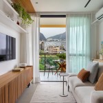 Branco e madeira criam décor cozy em apartamento de 70 m²
